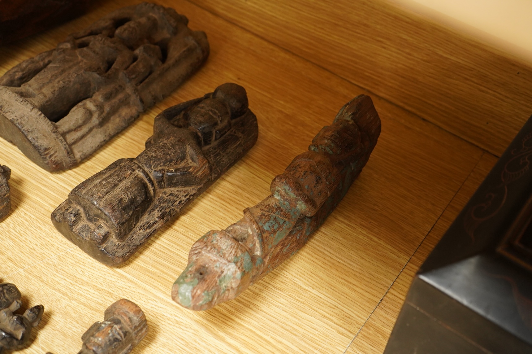 A group of Indian carved figures of deities, largest 42.5cm